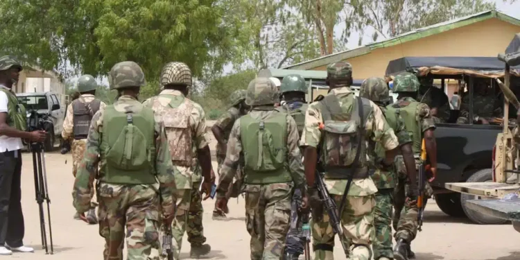 (VIDEO) Nigerian Military Personnel Storm Ikeja Electricity Headquarters, Assault Staff