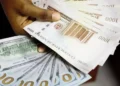Naira Weakens Slightly to N1,467/$1 Despite Rising Foreign Reserves