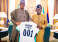 President Tinubu Receives Customized Super Eagles Jersey From NSC Chairman, Shehu Dikko