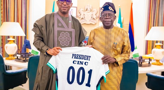 President Tinubu Receives Customized Super Eagles Jersey From NSC Chairman, Shehu Dikko