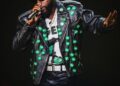 Davido Wears Jacket Bearing Names Of Abducted Oyo Pupils And Teachers At FIFA Concert