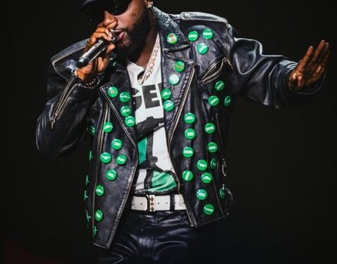Davido Wears Jacket Bearing Names Of Abducted Oyo Pupils And Teachers At FIFA Concert